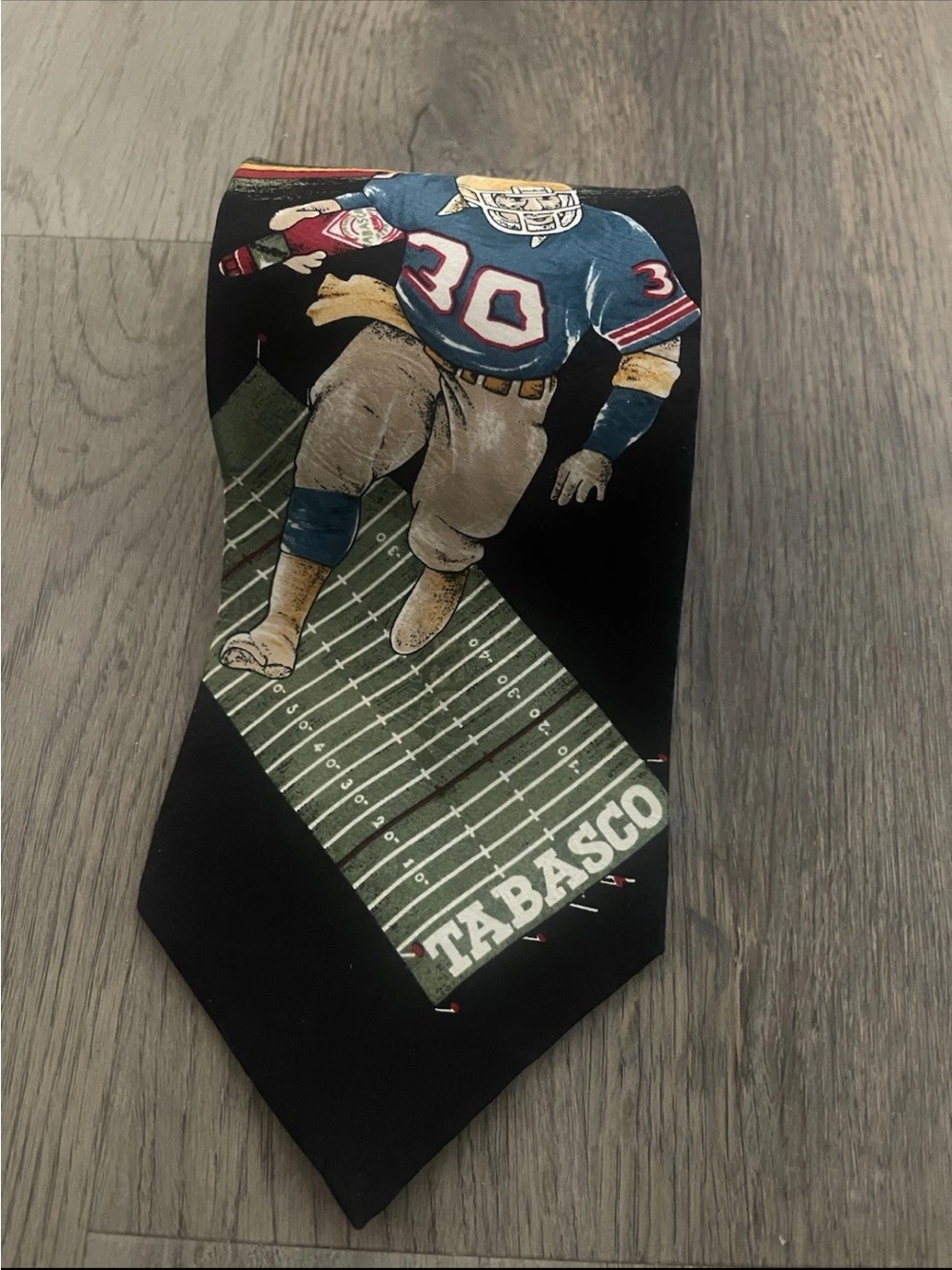 Tabasco Black Tie with Blue & Green Football Player Design